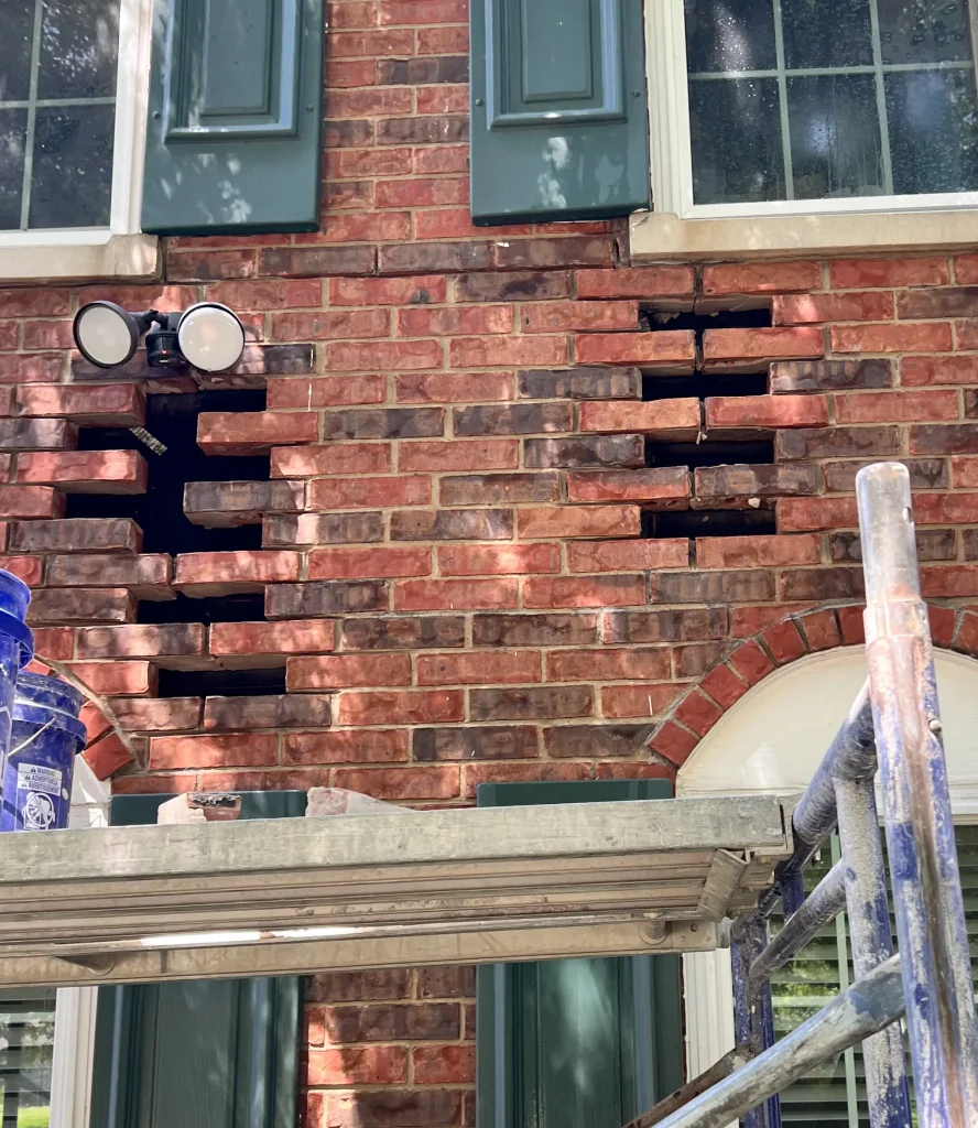 Damaged bricks and mortar removed during a masonry repair project