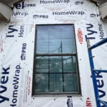 All the bricks and stones are removed so they can be replaced as needed with lighter weight faux stone material and reset and properly supported.