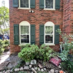 Lonestar Masonry Repair Brick and Mortar Repair service - with Brick and Mortar Matching - After the repair was performed fixing cracks around windows and arches in the brick wall of a house