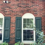Lonestar Masonry Repair Brick and Mortar Repair service - with Brick and Mortar Matching - After the repair was performed fixing cracks around windows and arches in the brick wall of a house